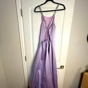 Beautiful party dress, light purple, with open back and lace tie. Size 11-12.